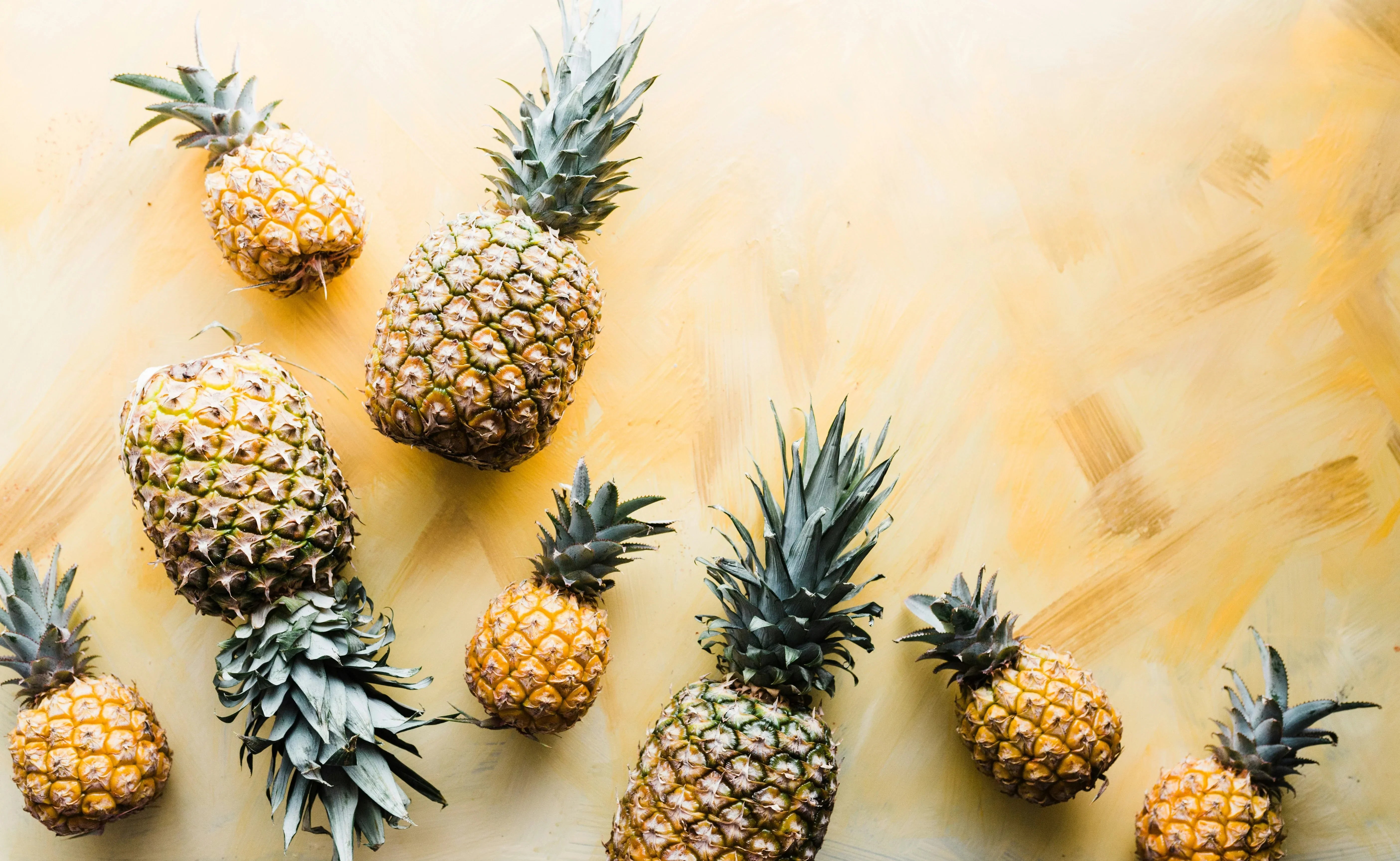 pineapples on a yellow background