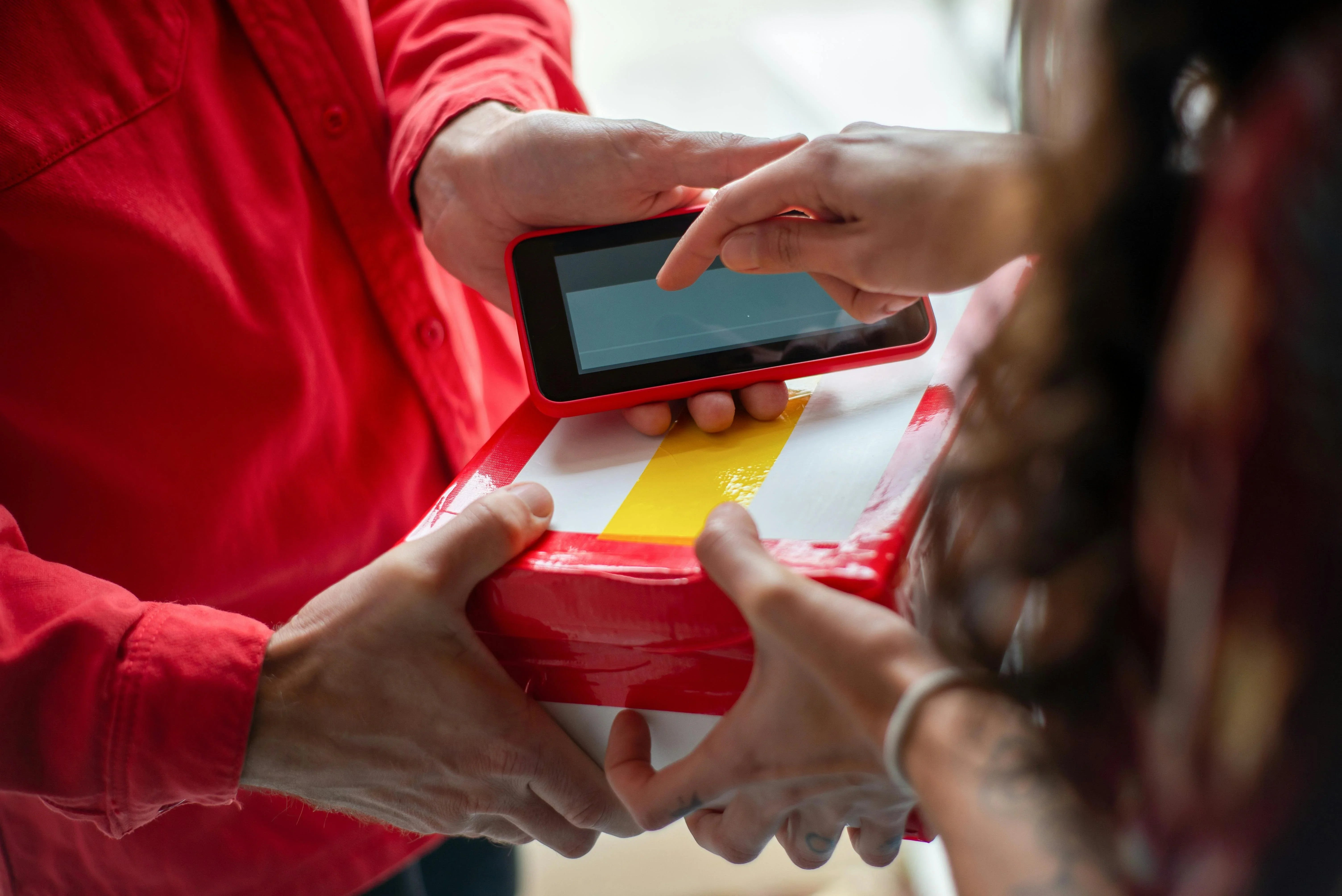 person signing for a parcel delivery