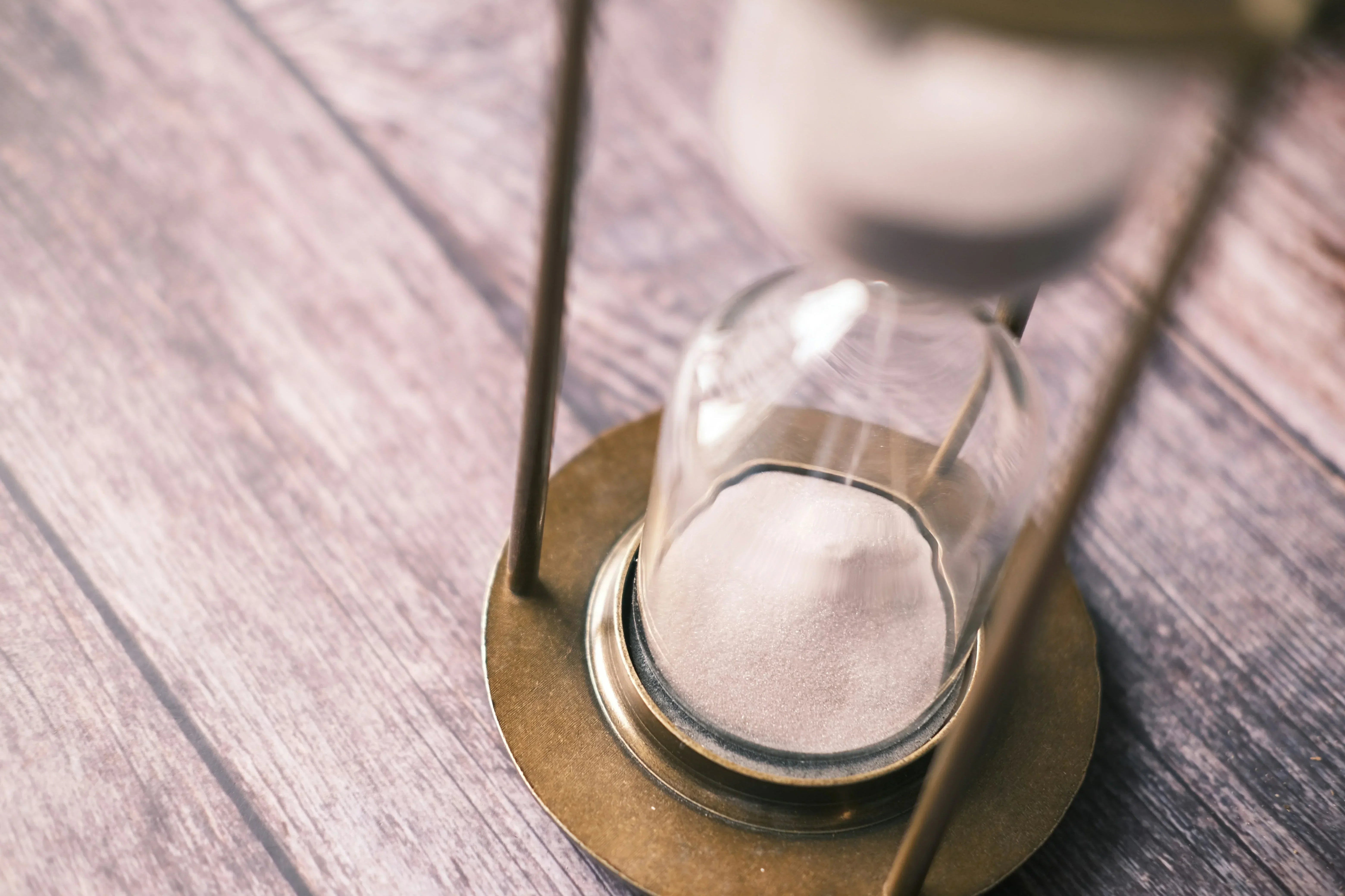 Image of an hourglass counting down